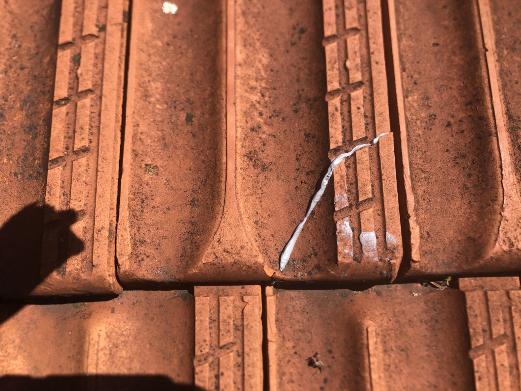 Broken roof tile repaired