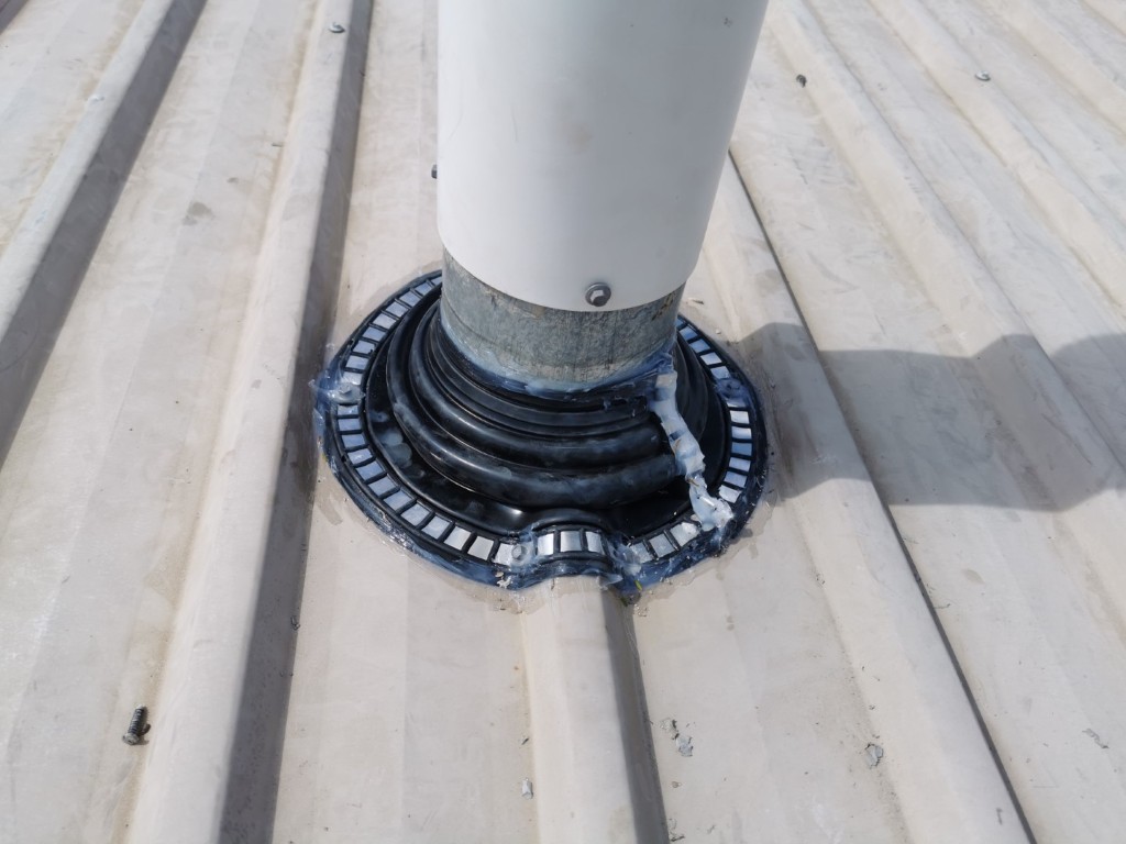 New dektite seal around roof protrusion on a steel roof